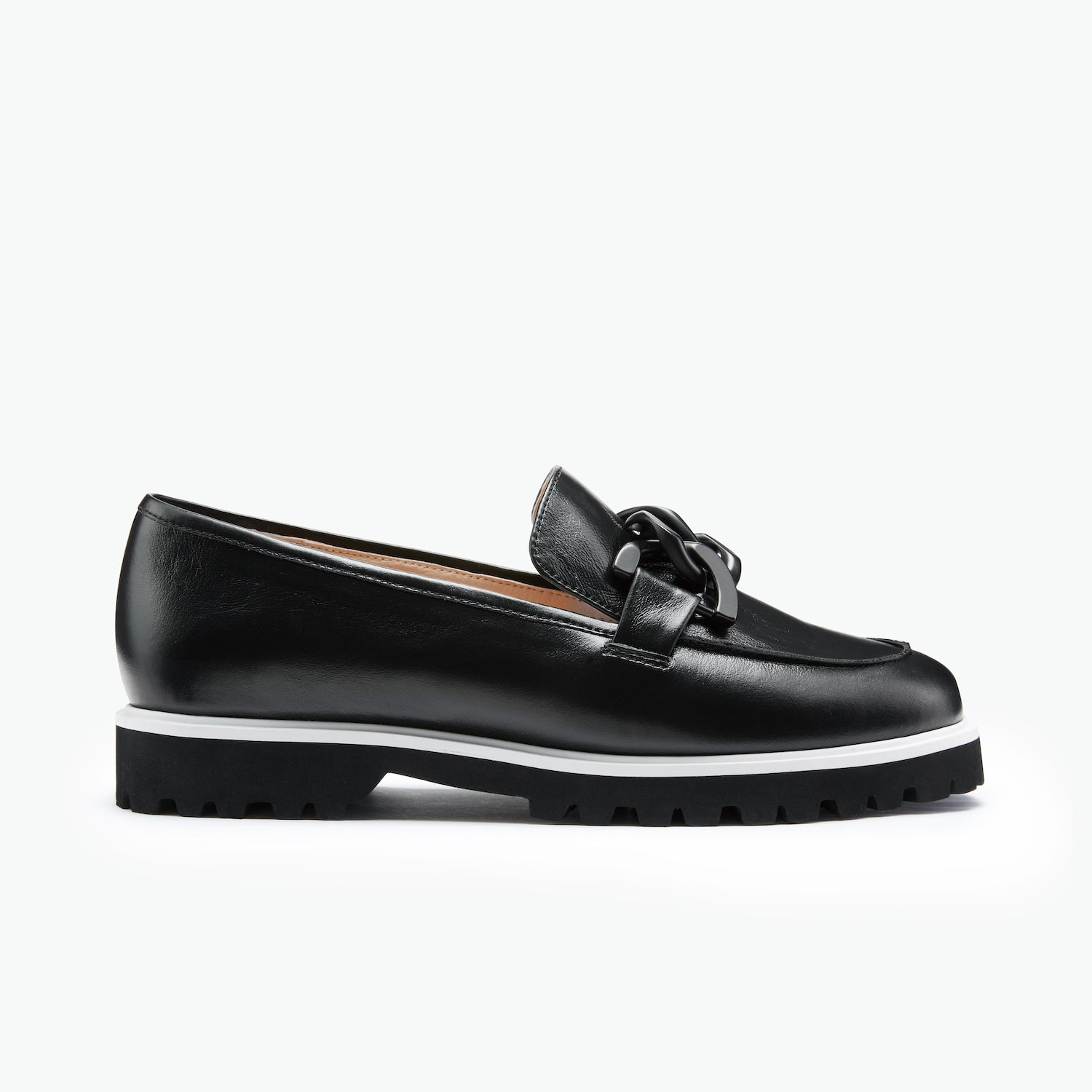 Black chunky sole loafer shoe on a white background with a black buckle.