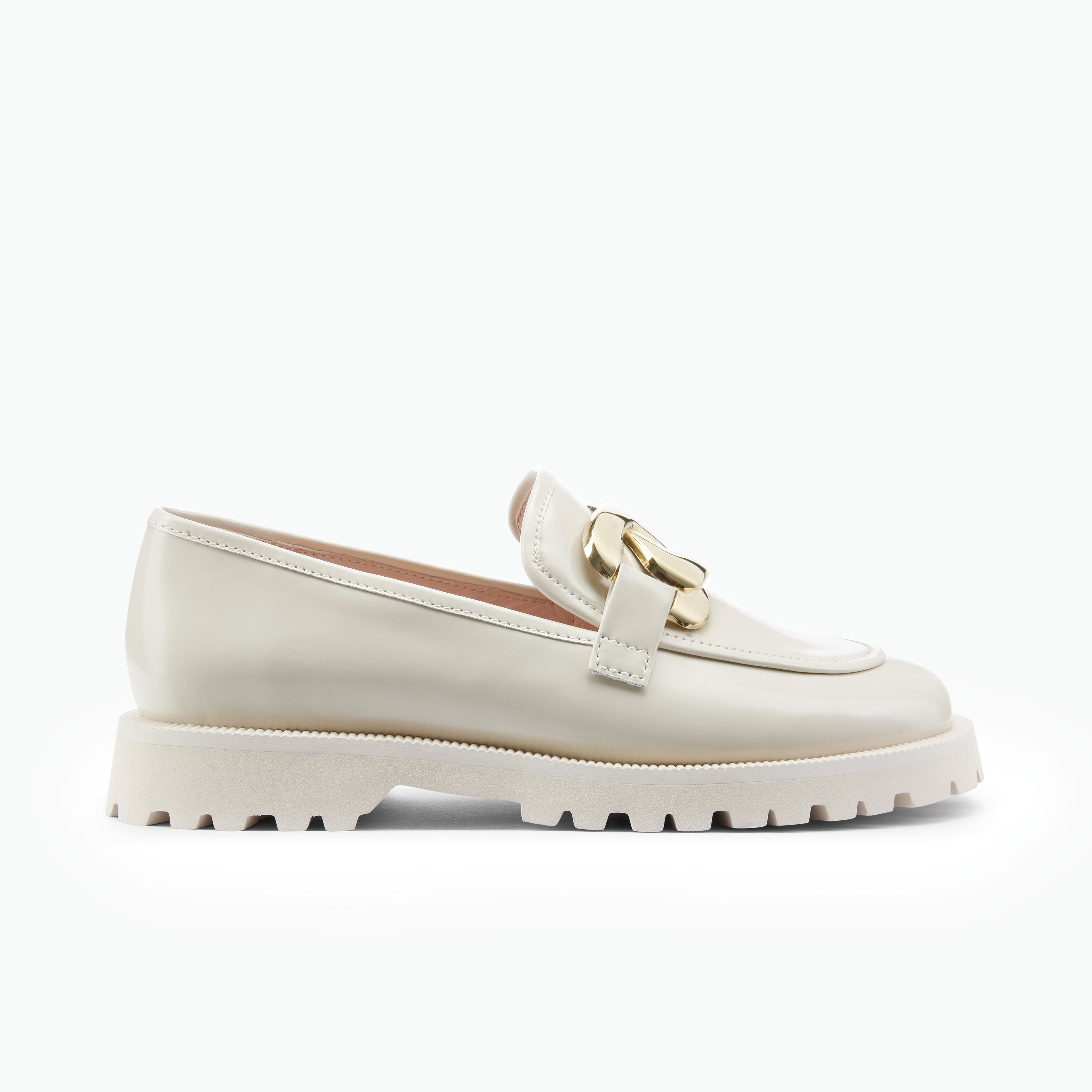 Ivory loafer with chunky sole on white background