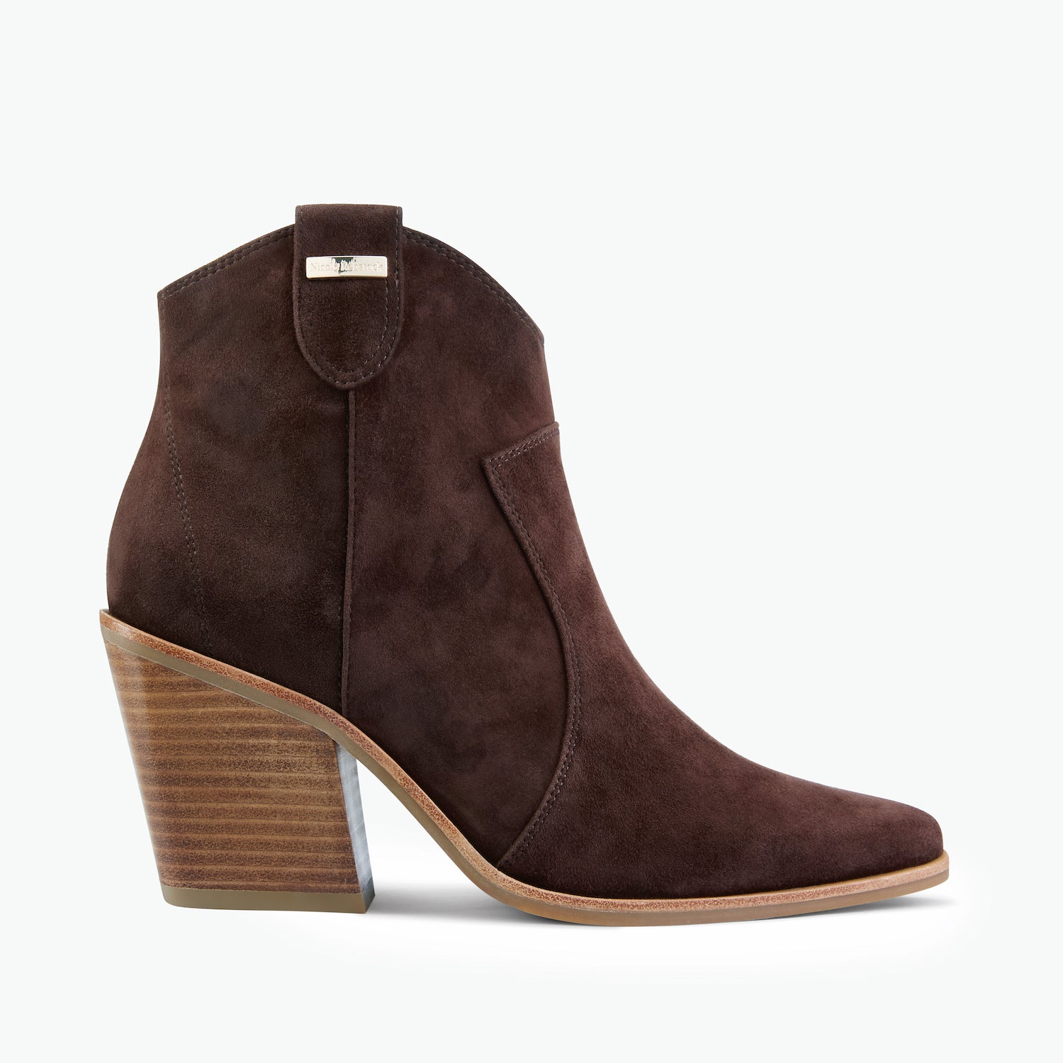 Brown suede ankle boot with wooden heel on a white background