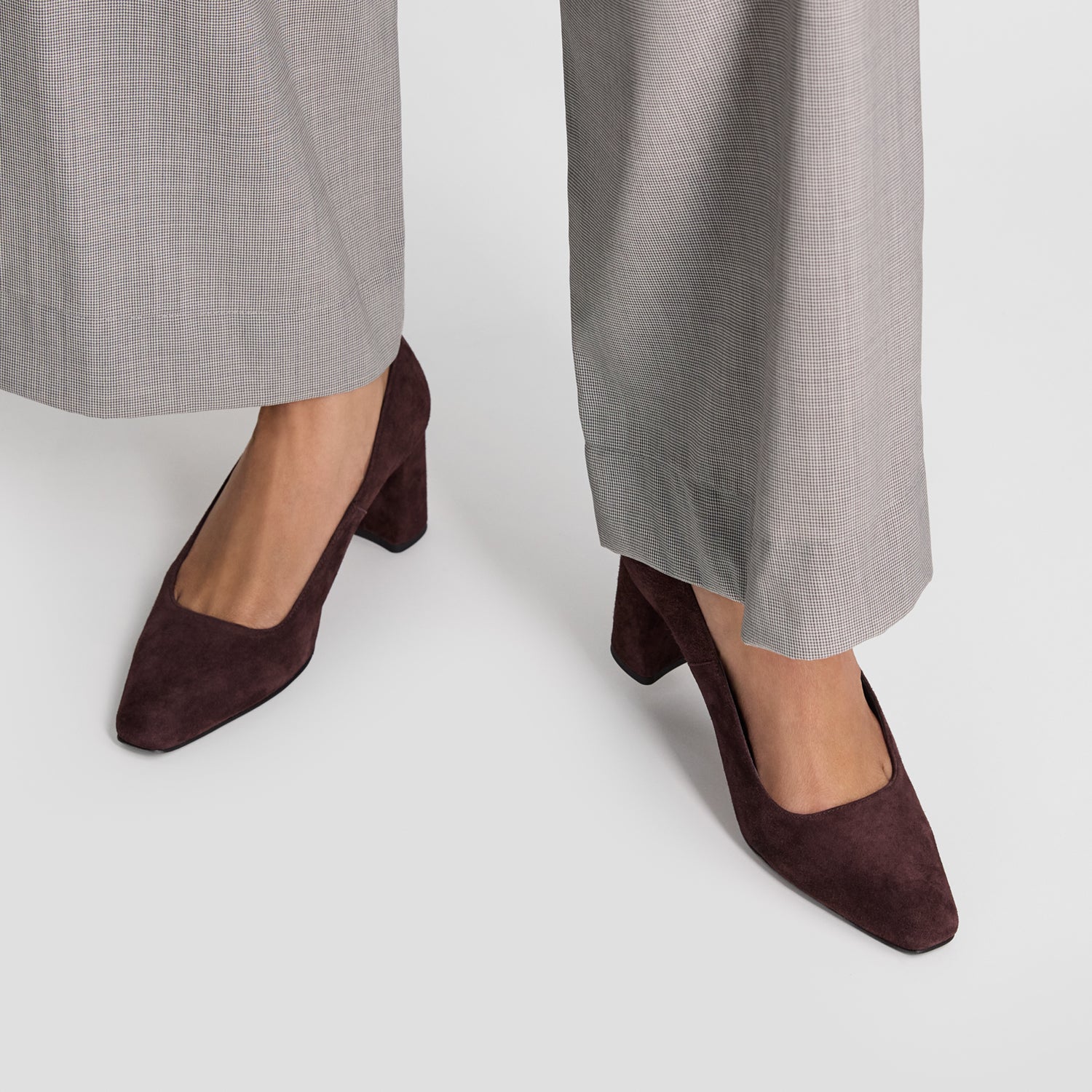 close up on feet of Isla pumps by Nicole Rebstock with square toe and block heel.