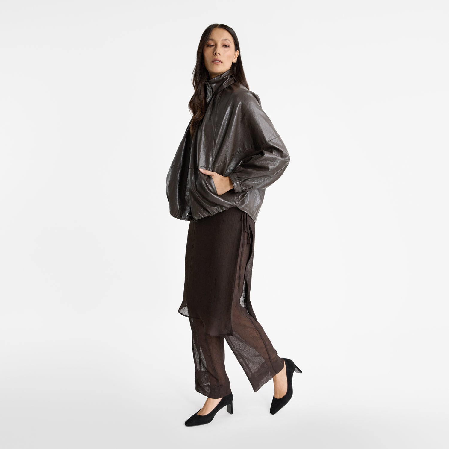 Woman modelling NIcole rebstock's Iso Heels in black suede with a square toe and medium height block heel.