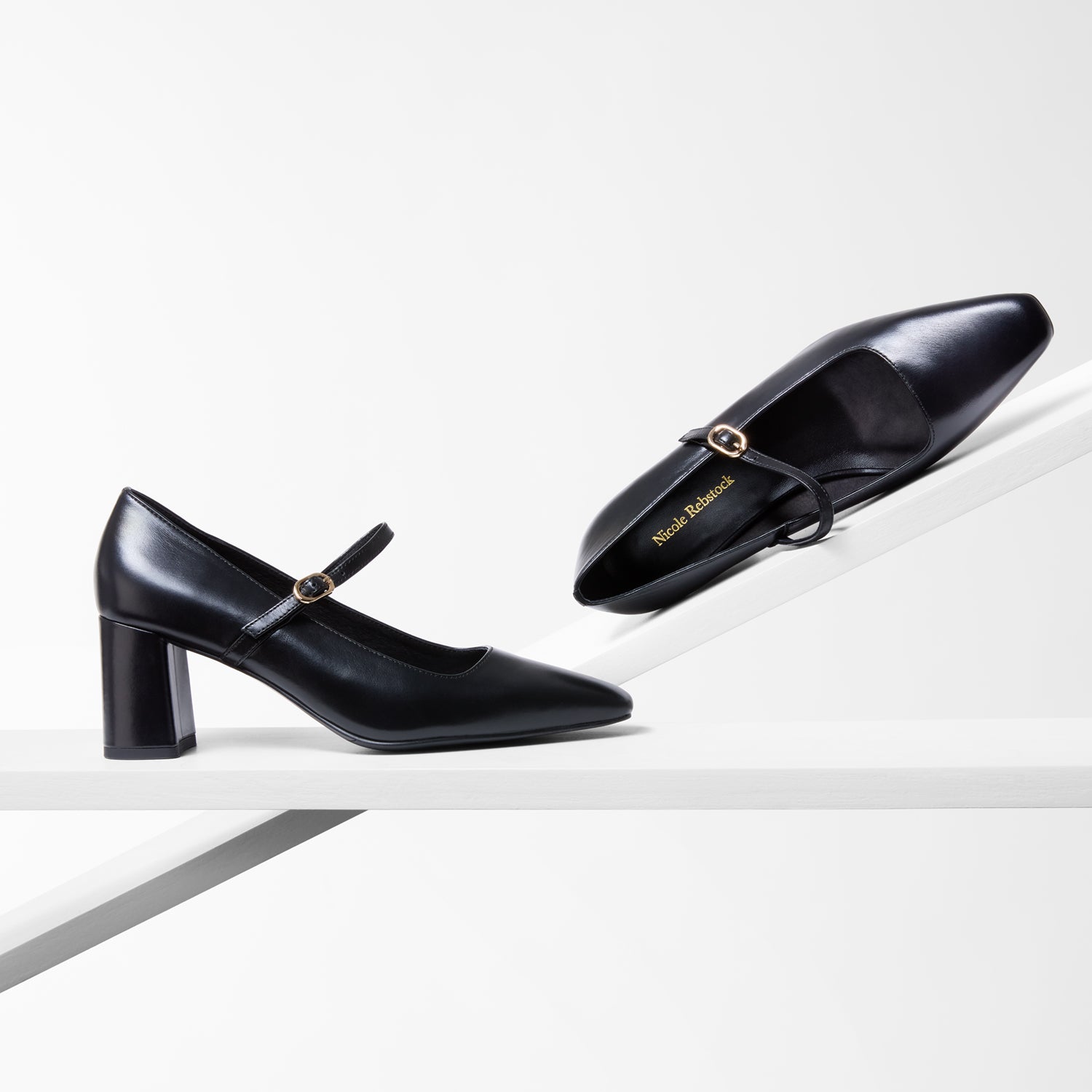Black leather block heel pump called Ivy with square toe by Nicole Rebstock