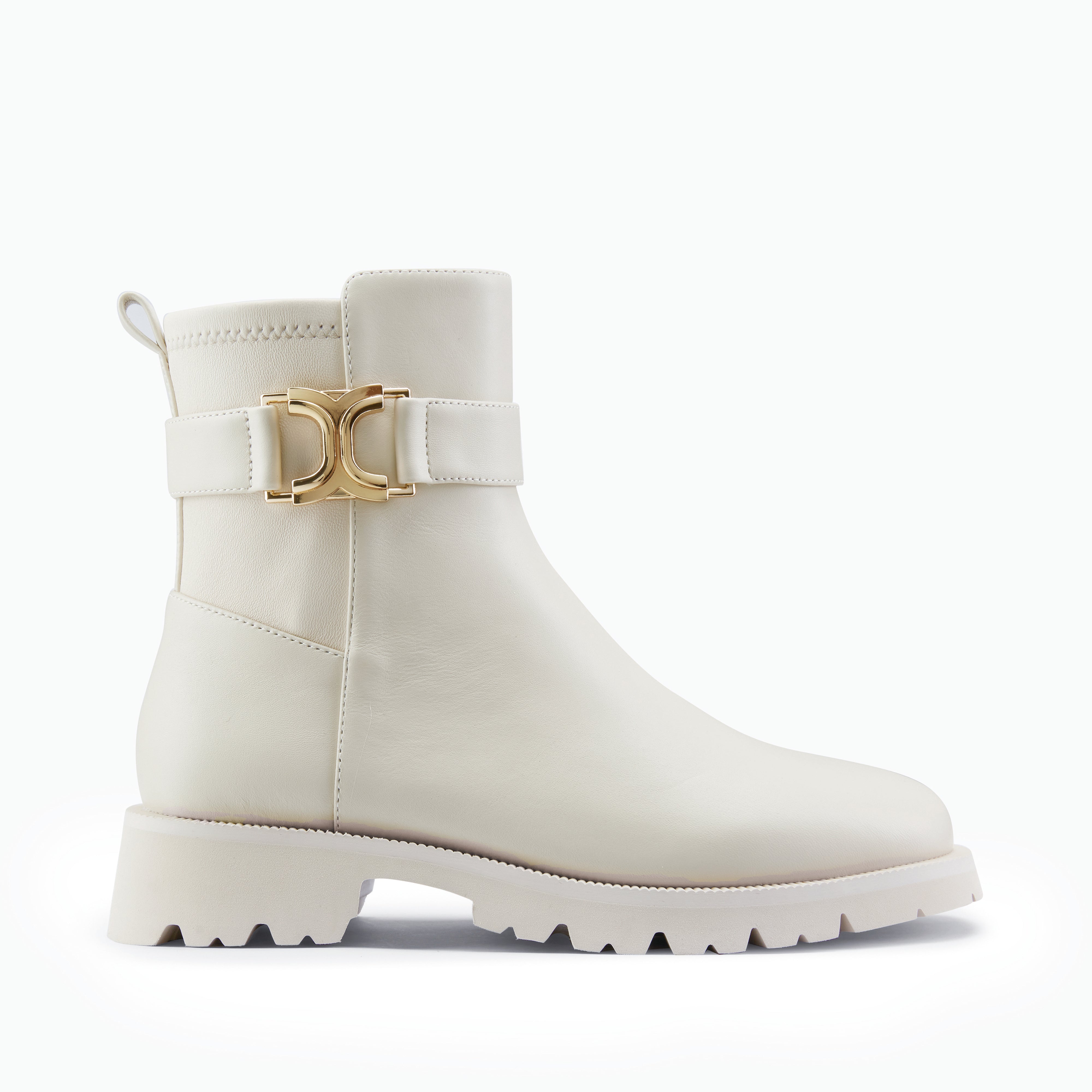 Ivory leather boot with a gold buckle on a white background