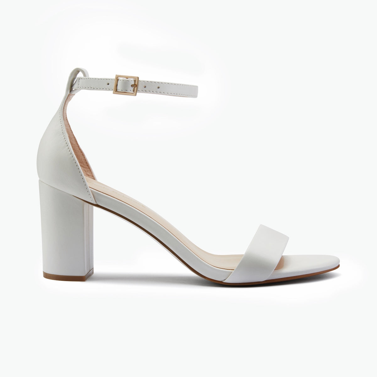A white leather block-heel sandal with a single toe strap and an adjustable ankle strap featuring a gold-tone buckle, shown from a side profile on a white background.