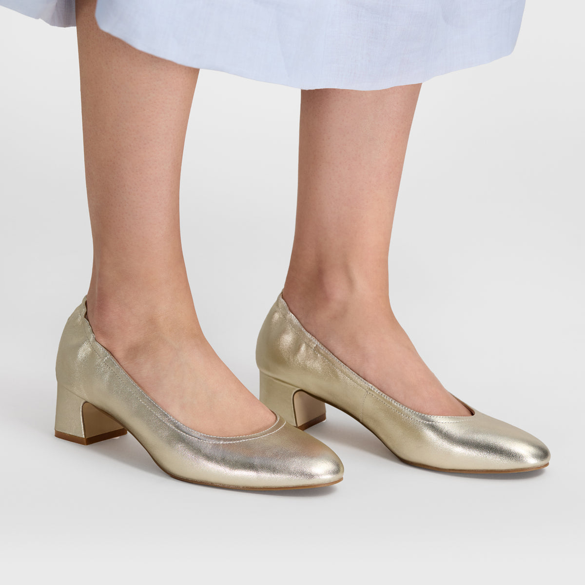 Champagne leather 4.5cm block heel pumps by Nicole Rebstock