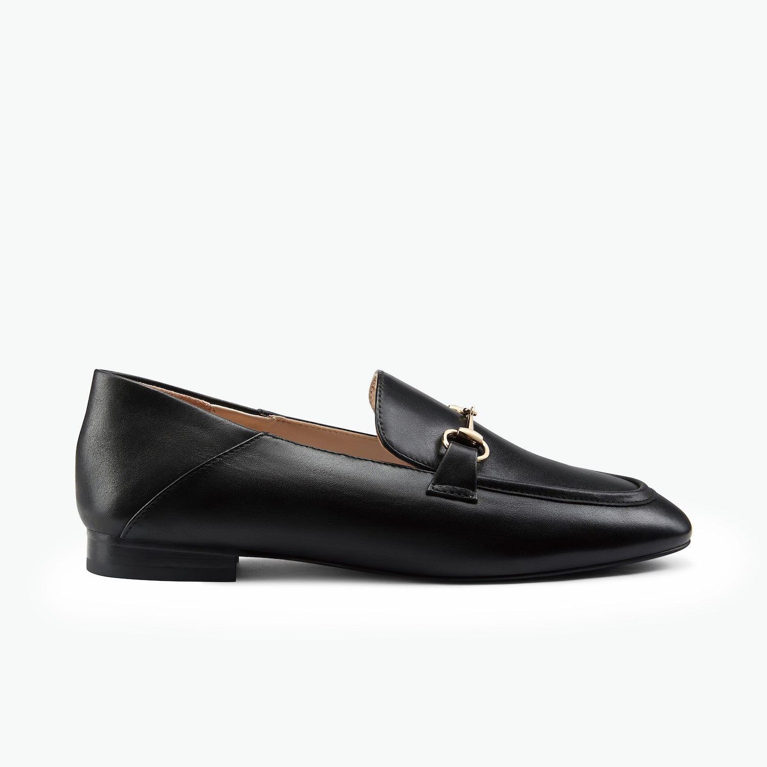 Black loafer with gold horsebit detailing