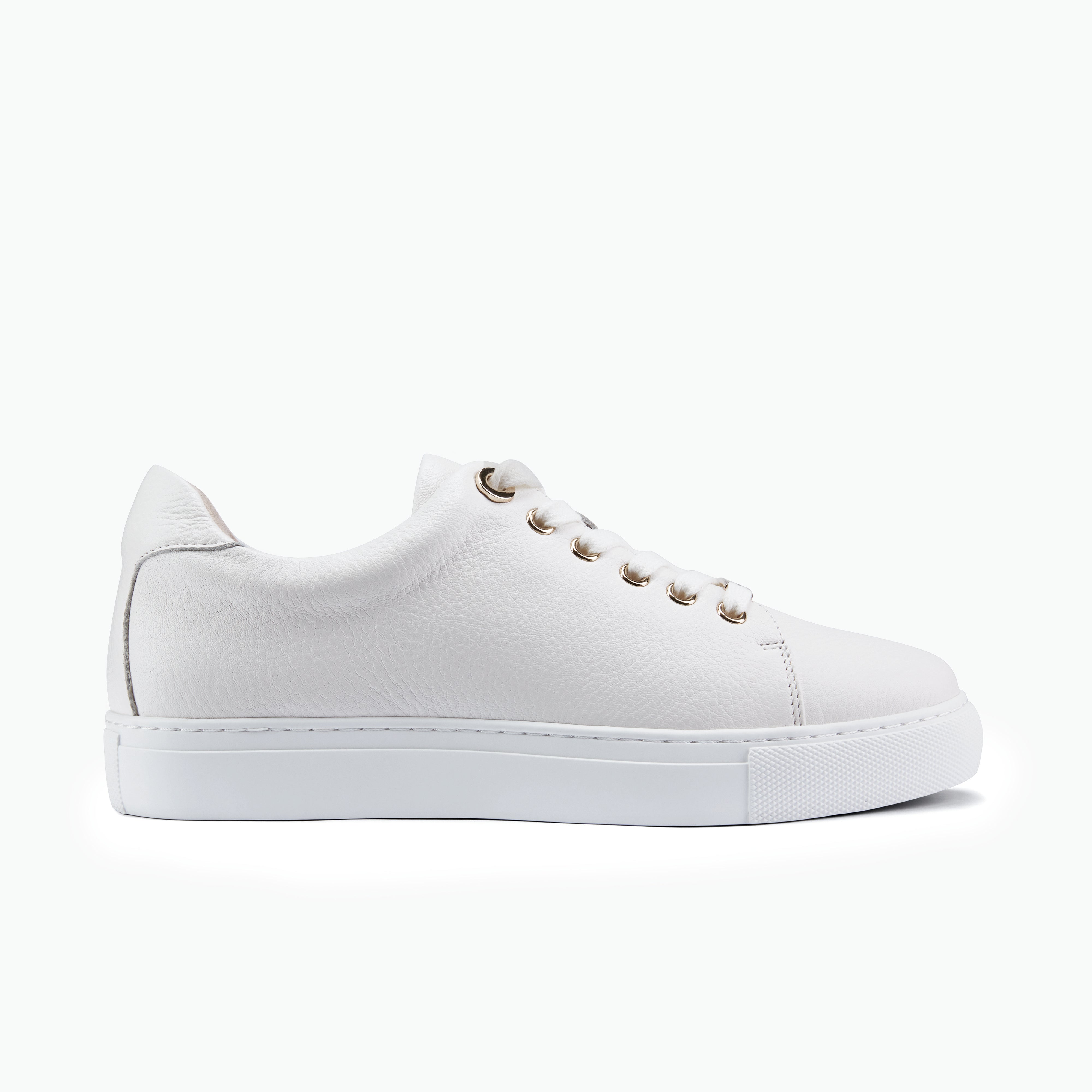 A white pebble leather sneaker with gold hardware accents and a cushioned insole.