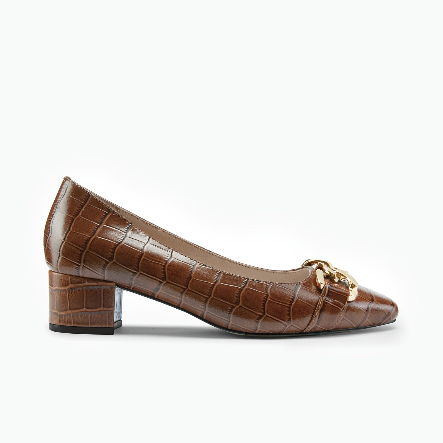 Brown crocodile-patterned shoe with a gold chain on a white background