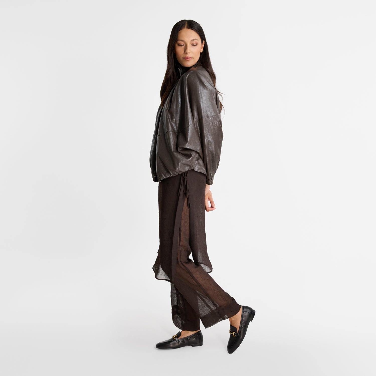 Model wears Nicole Rebstock's Mel Loafer in black leather.