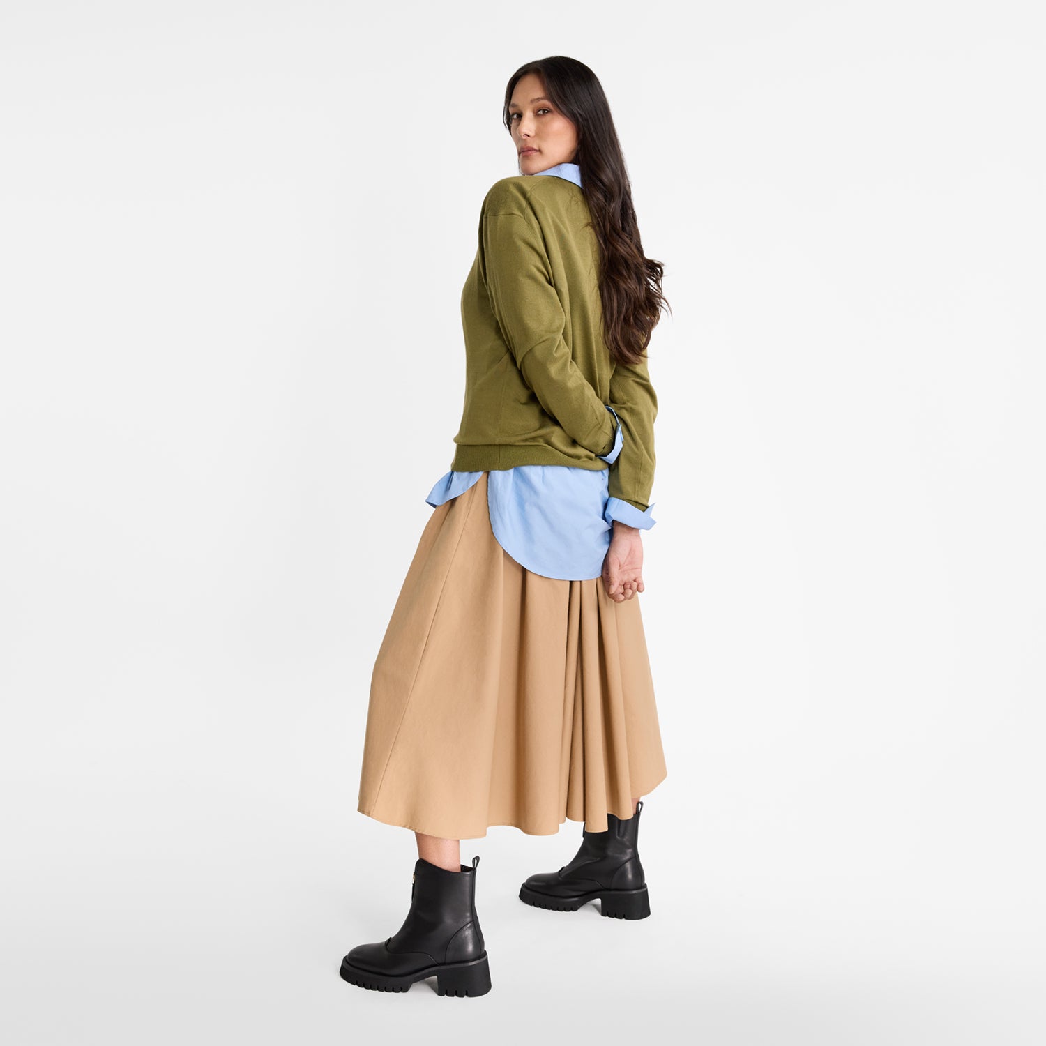 Woman wearing Nicole Rebstock Nola ankle boots.