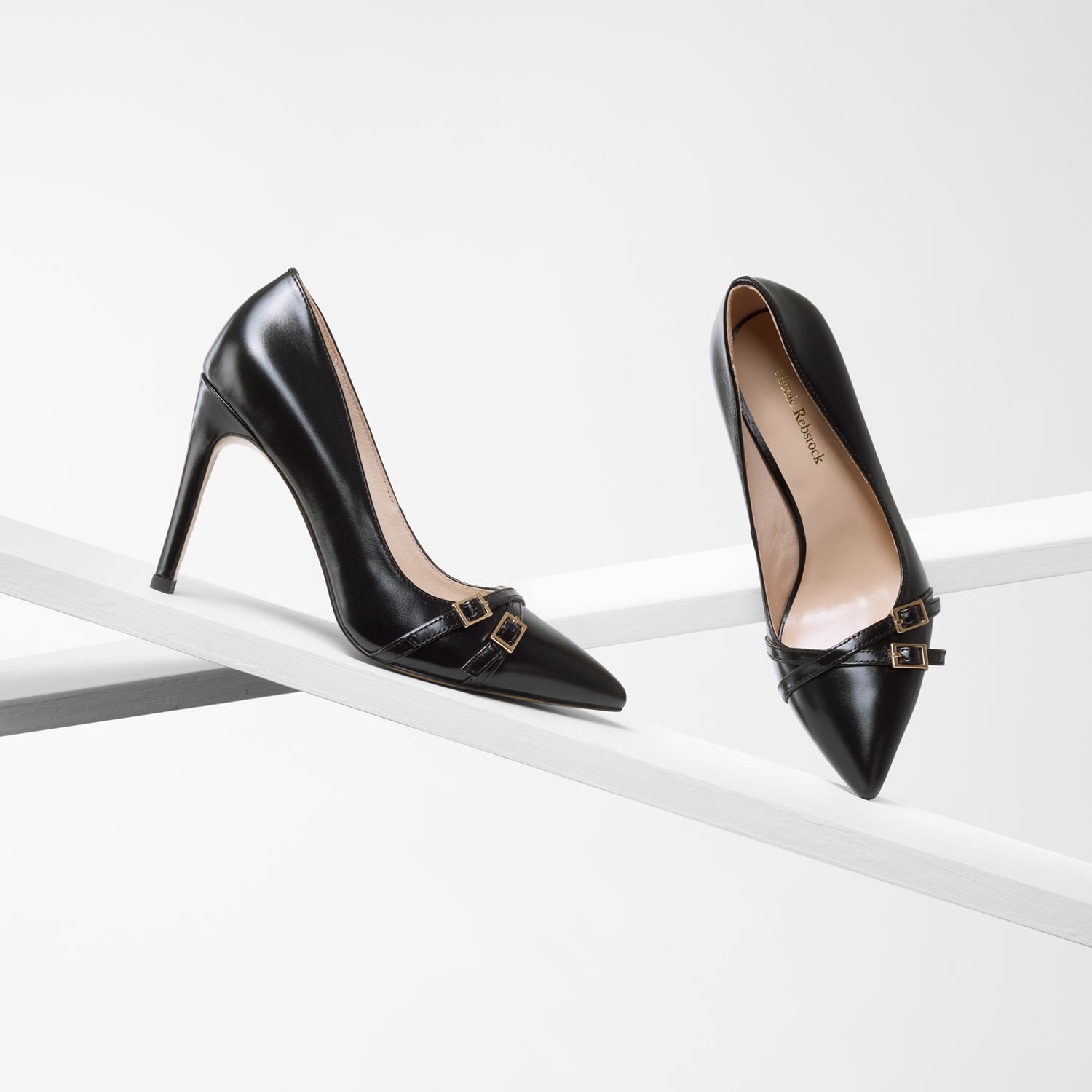 Nash black oiled leather court shoe shown on planks from all angles.