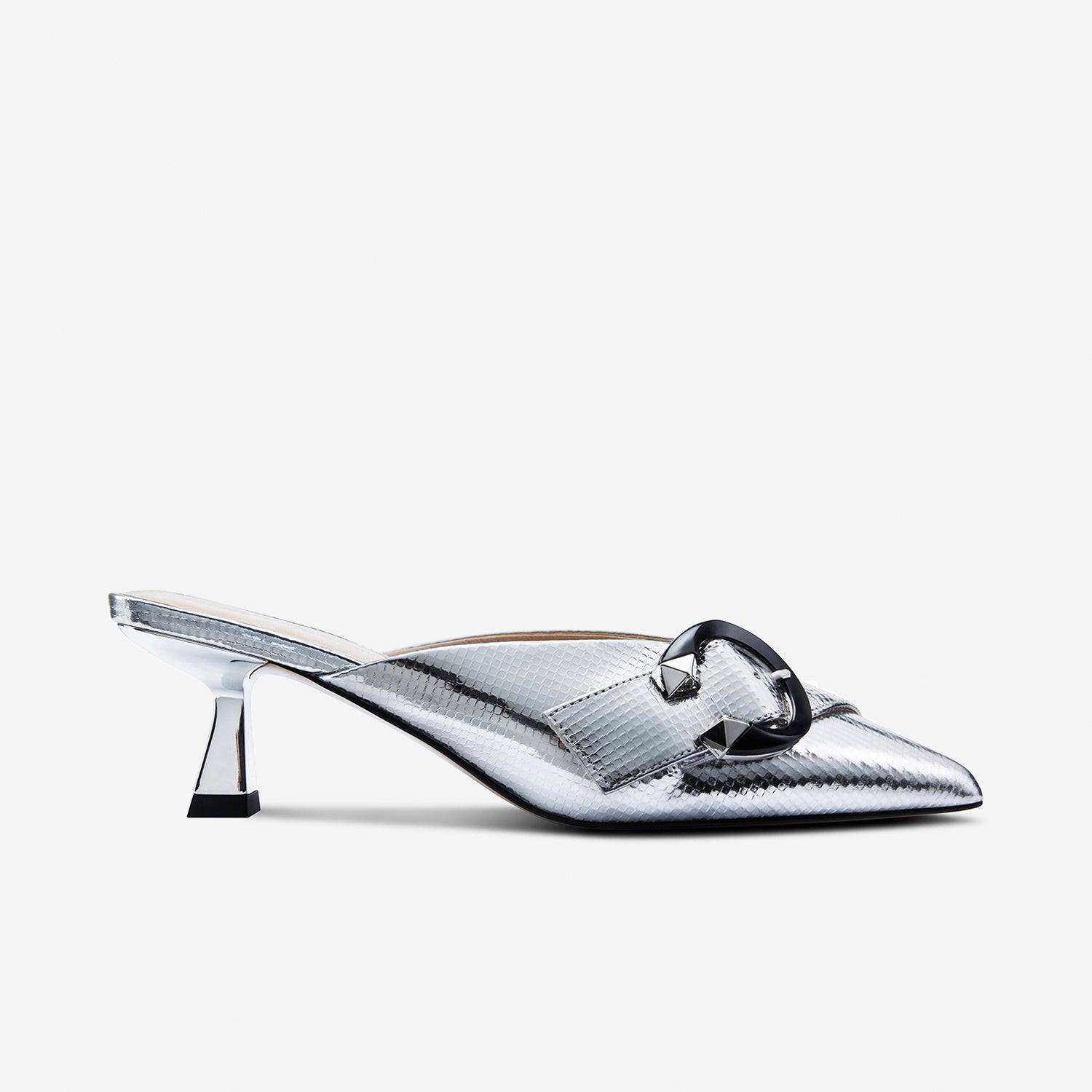 Sandro heel shown from side in disco ball silver leather. The kitten heel mule is 5.5 cm.