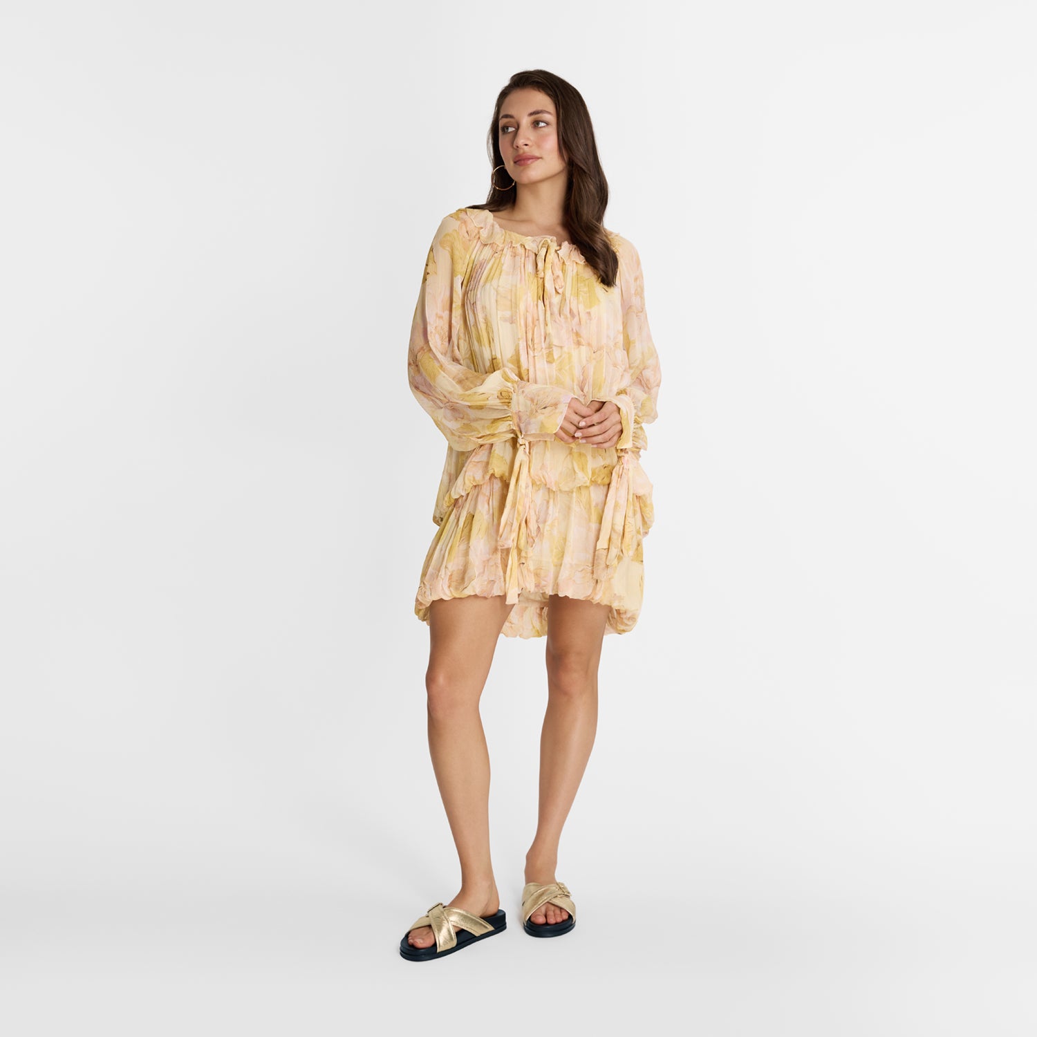 Woman wearing Uma gold slide by Nicole Rebstock with gold buckles.