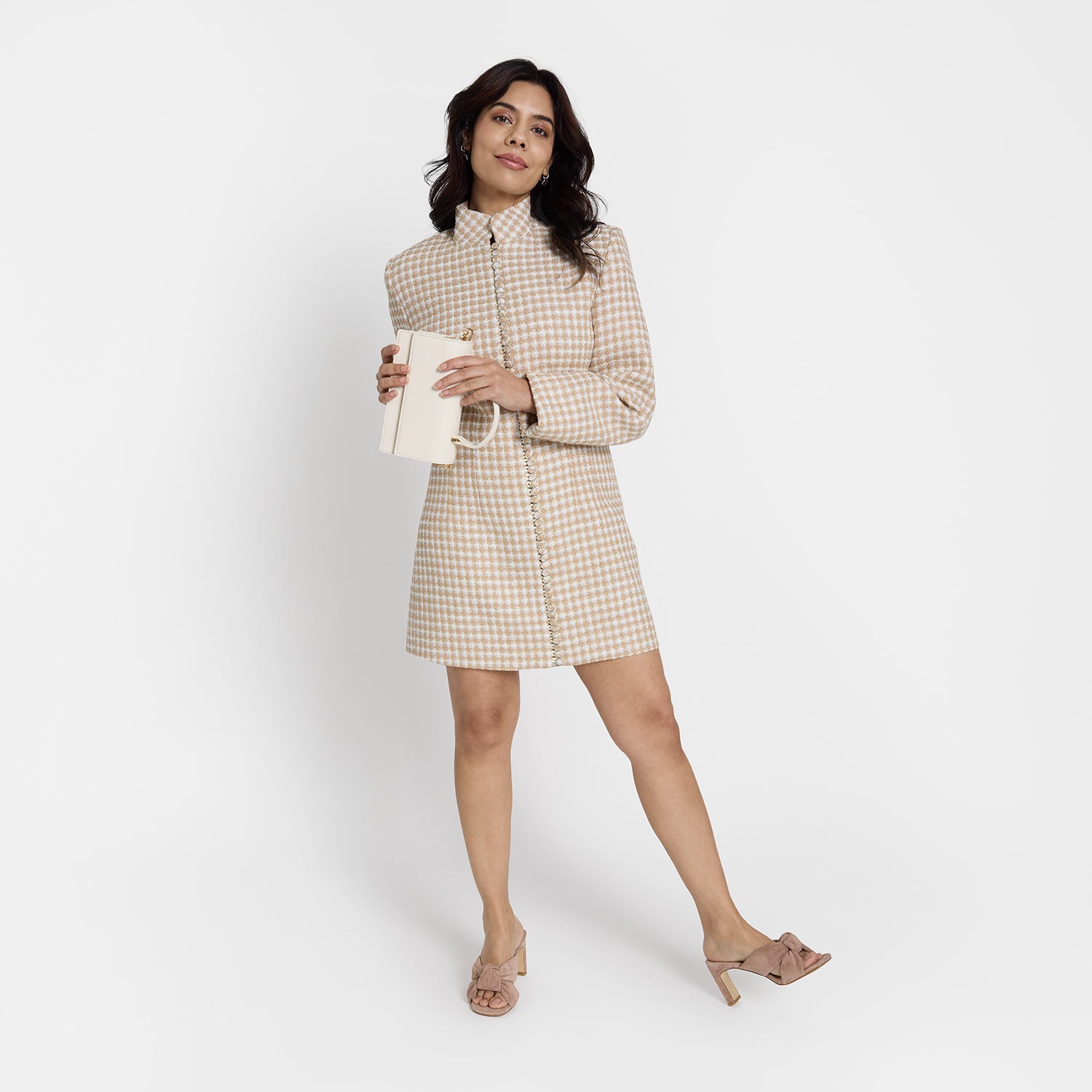 Velma dirty blush suede mule on model wearing a dress.