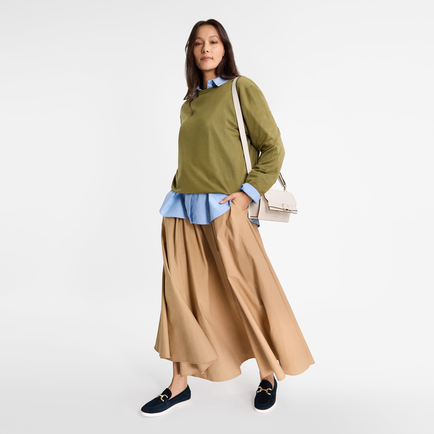 model wearing flat Wynn Loafer in navy suede by Nicole Rebstock.