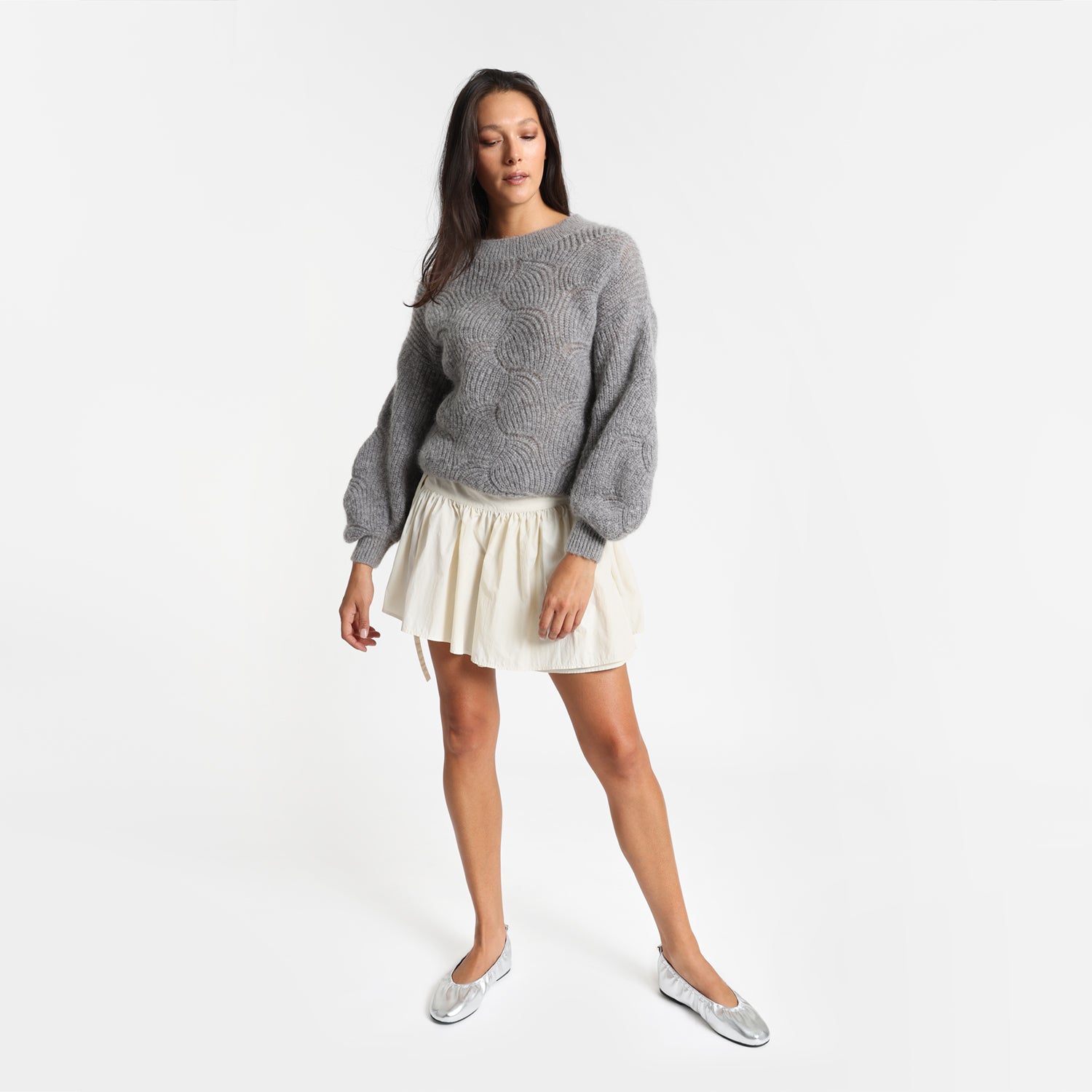 Xia silver scrunchie ballet flat worn by model.