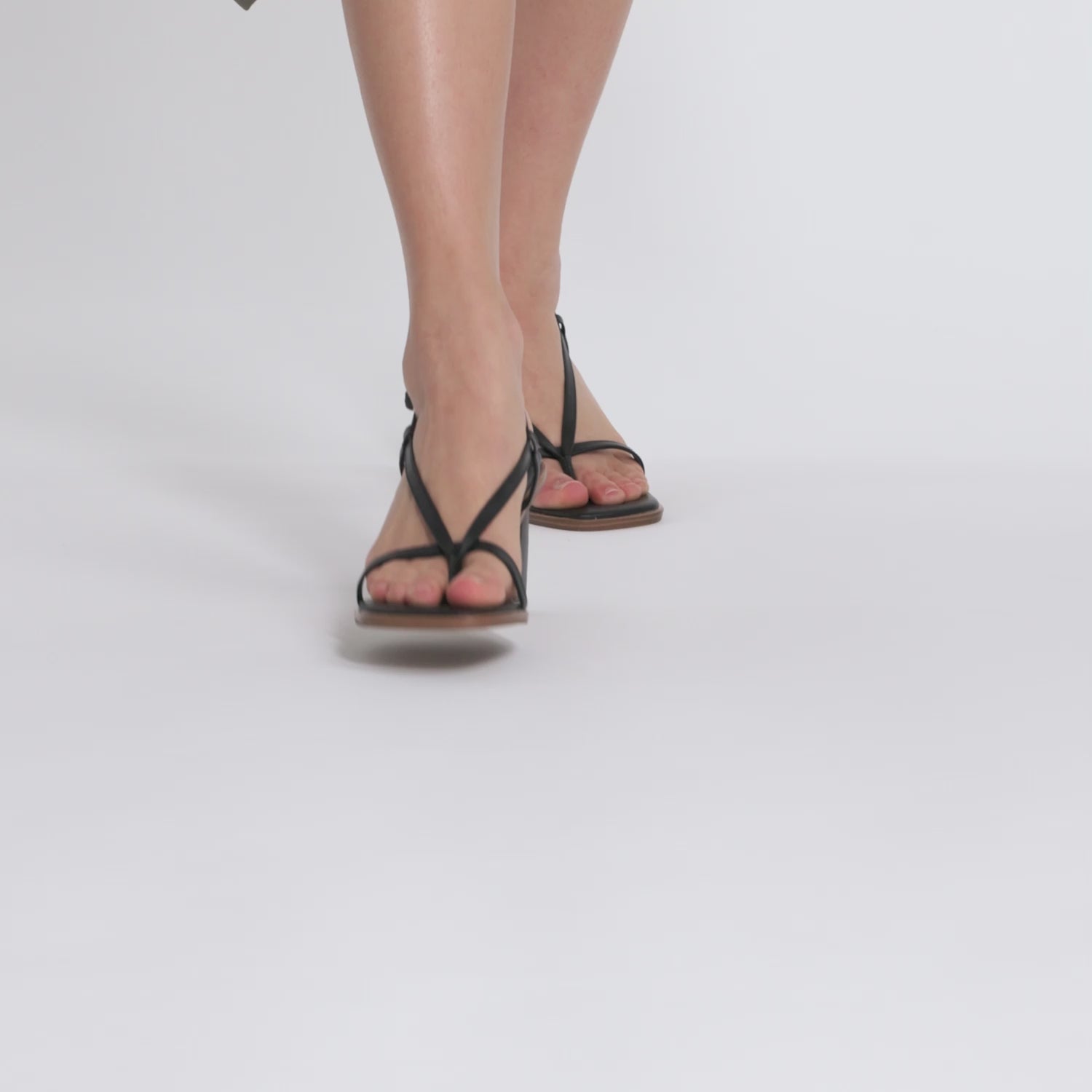 Video of model wearing back 7cm Tall Black Milla sandal 