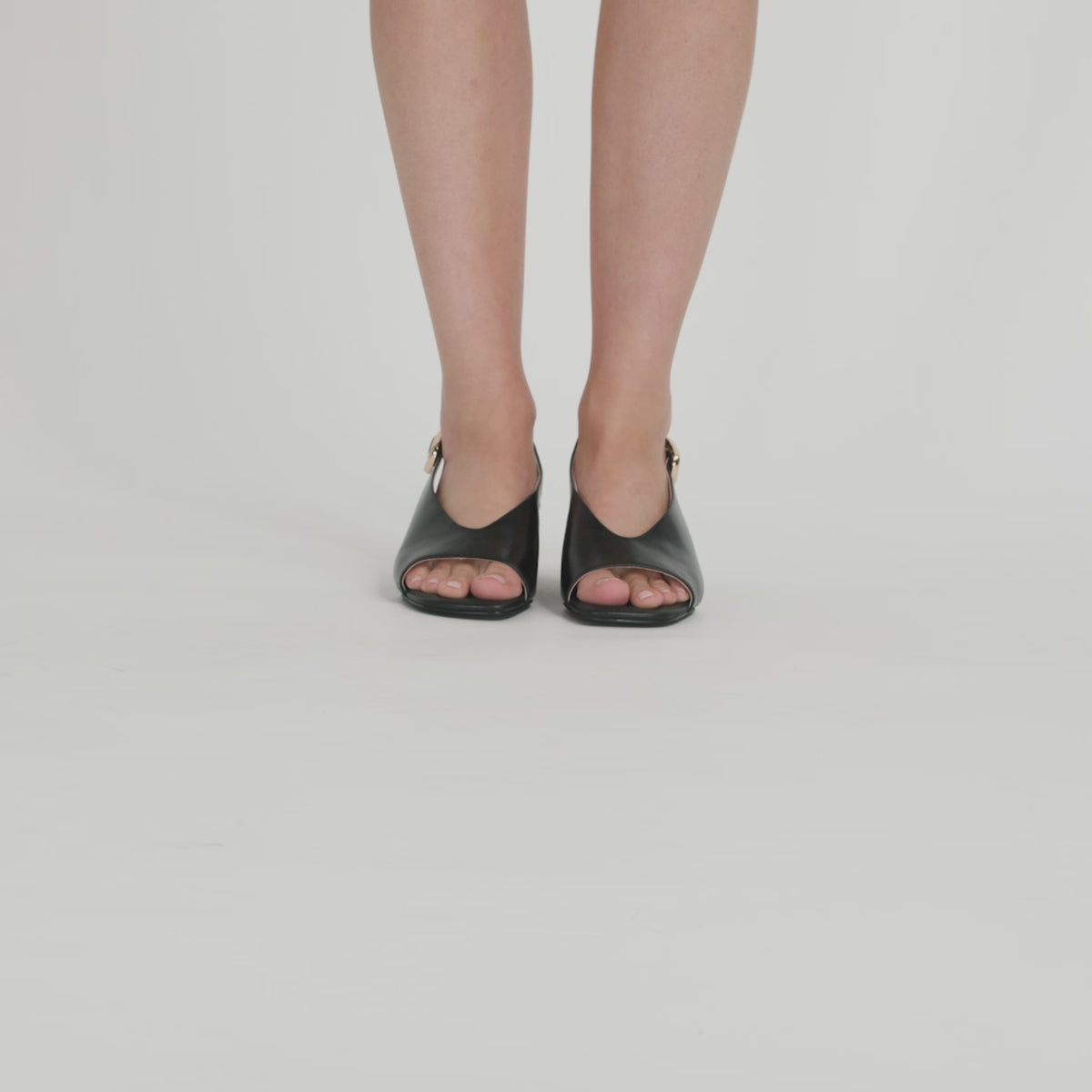 Video of Nicole Rebstock's Andy Sandal in Black high gloss leather.